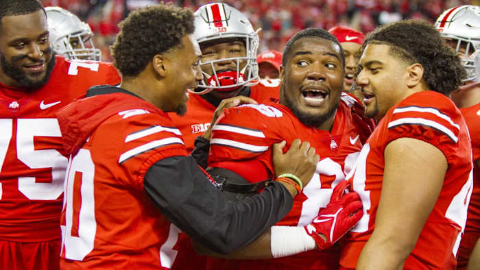 74. Thayer Munford, Mitchell Melton, Jerron Cage and J.T. Tuimoloau